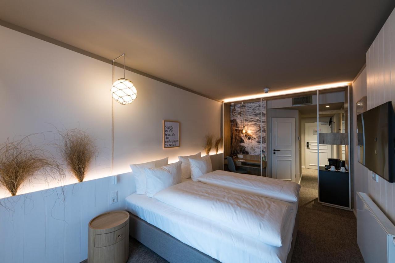 Hafenhotel Zu พุทบัส ภายนอก รูปภาพ