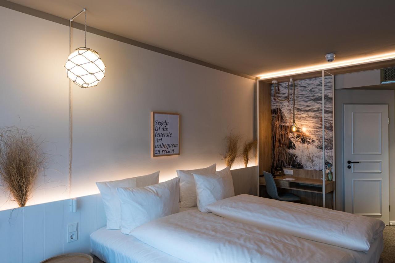 Hafenhotel Zu พุทบัส ภายนอก รูปภาพ