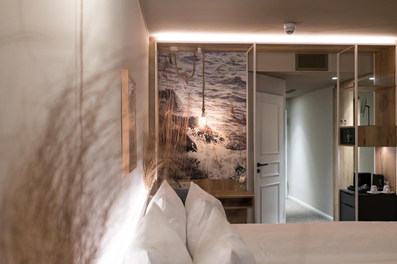 Hafenhotel Zu พุทบัส ภายนอก รูปภาพ
