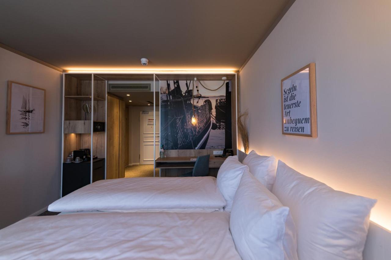 Hafenhotel Zu พุทบัส ภายนอก รูปภาพ