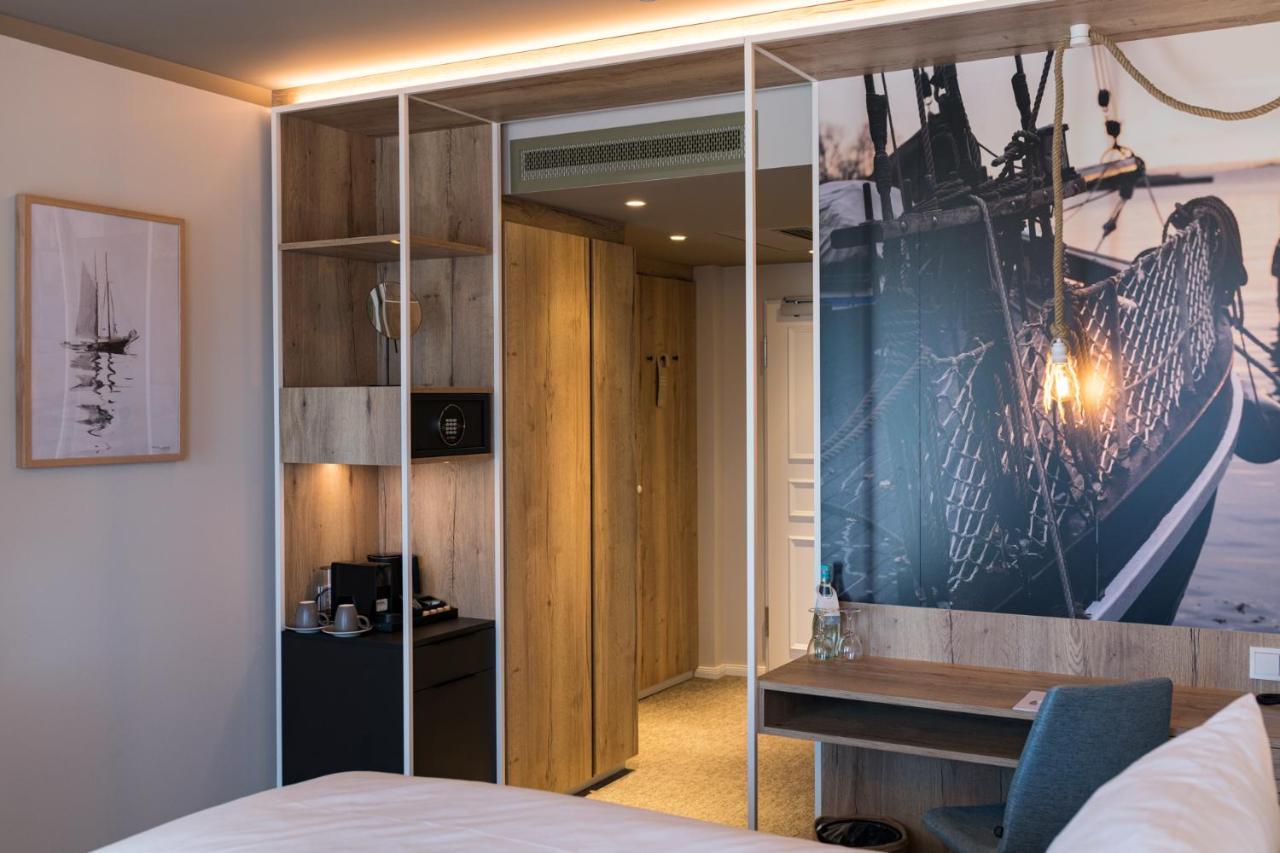 Hafenhotel Zu พุทบัส ภายนอก รูปภาพ