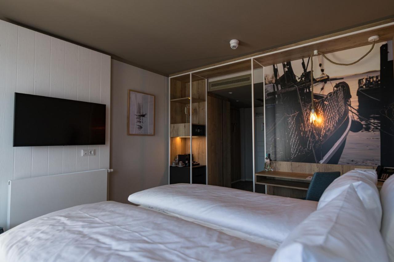 Hafenhotel Zu พุทบัส ภายนอก รูปภาพ