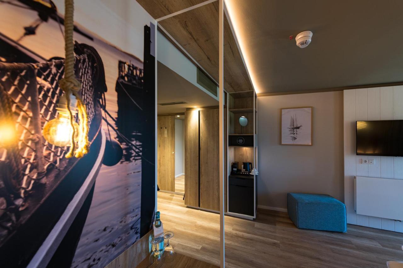 Hafenhotel Zu พุทบัส ภายนอก รูปภาพ