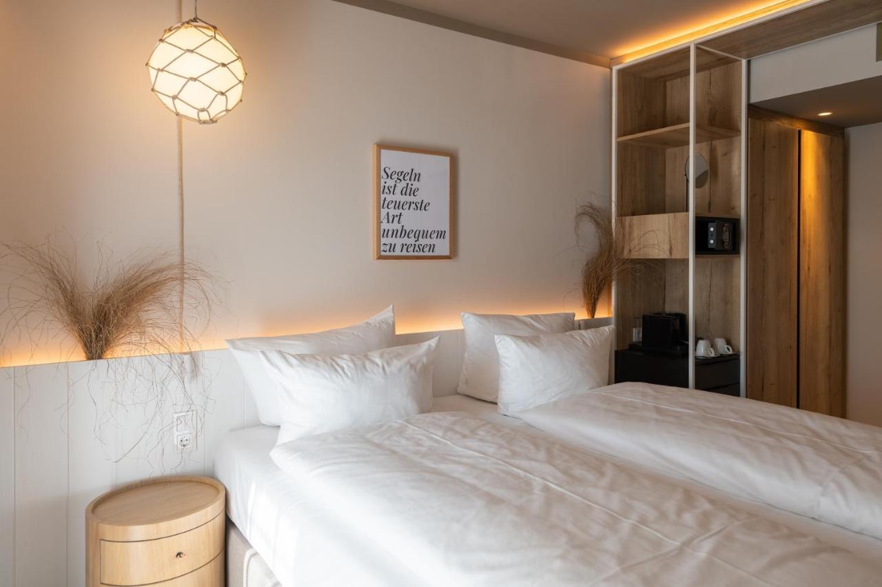 Hafenhotel Zu พุทบัส ภายนอก รูปภาพ